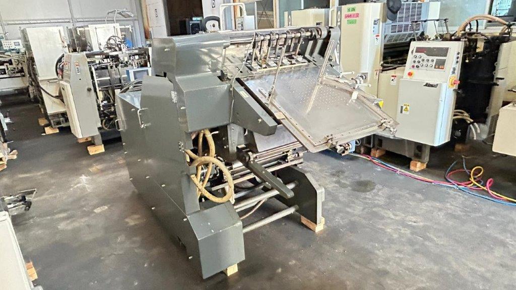Automatic envelope making and binding machine